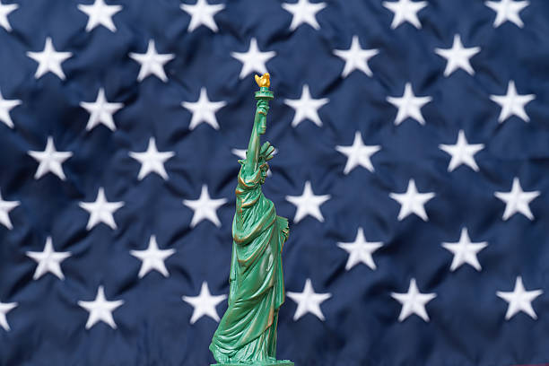 istock american flag video with statue of liberty 2233845751