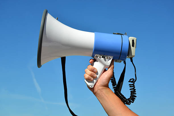 istock Loudhailer in a tout’s hand 2233847442