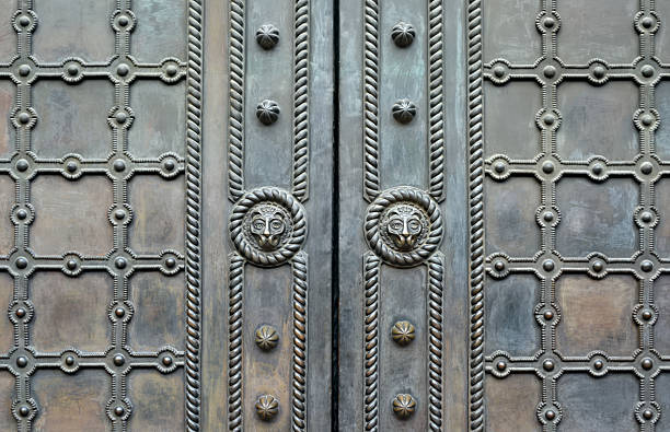 Forged ornament on old iron gates