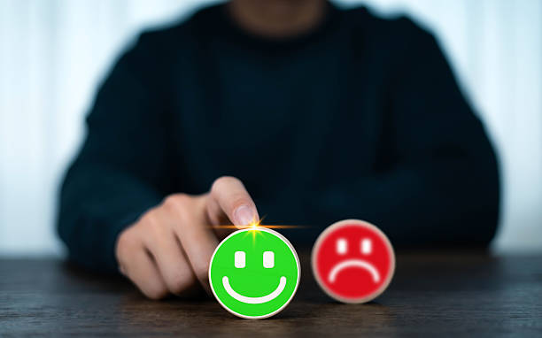 istock Customer satisfaction concept with person choosing happy smile face over sad face, feedback rating, positive review, service quality, survey, and user experience evaluation for business success. 2233849947