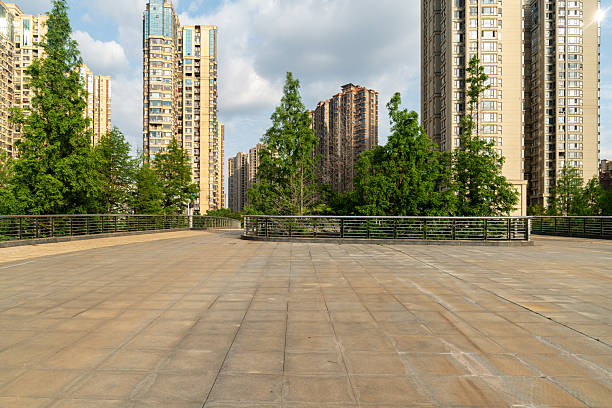 istock empty, modern square and skyscrapers in modern city 2233850244