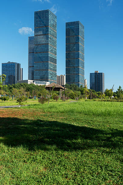 istock city park with modern building background in shanghai 2233850650