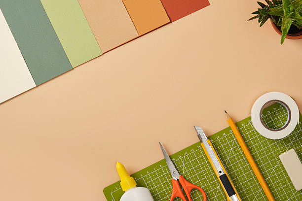 Craft tools on a desk. Creative workspace for art and handmade design preparation.