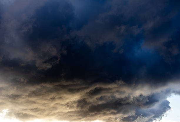 istock Dark storm clouds over illuminated horizon, Wirral, Merseyside, England, Britain 2233856975