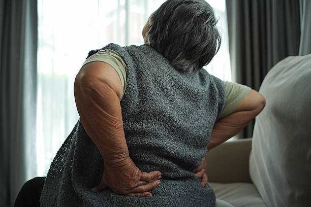 istock Elderly person suffering from back pain. 2233860015