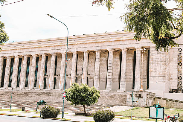 Buenos Aires, Argentina - March 15, 2020: Featuring a grand neoclassical facade with imposing columns and a majestic staircase, the Faculty of Law building at the University of Buenos Aires exemplifies architectural elegance