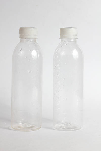 istock Hydration bottles lined up on white offer refreshment and sustainability in a clean, clear design 2233863916