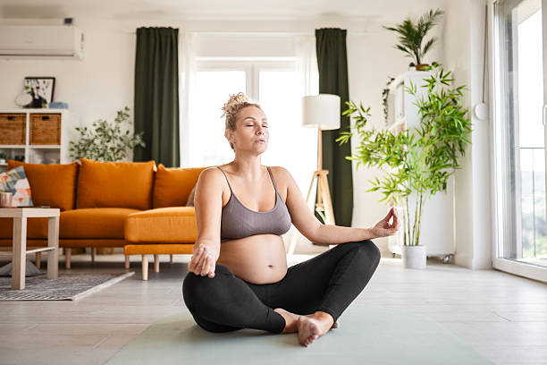 istock Healthy pregnancy meditation with future mom 2233867207