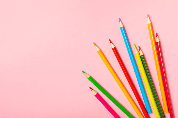 istock Colored pencils on a bright colored background. Equipment for coloring. Stationery for creativity.Back to school. Flatlay. Children's Creativity and Education. Rainbow.Space for text. Copy space. 2233869711