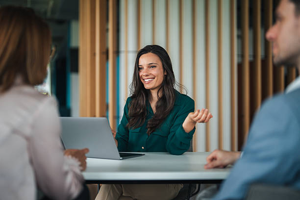 istock Female advisor meeting with clients 2233869717