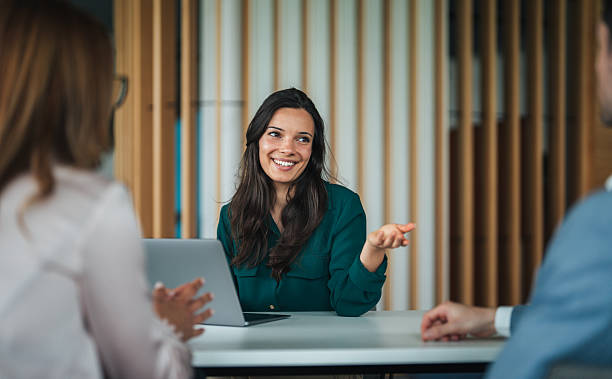 istock Female advisor meeting with clients 2233869722