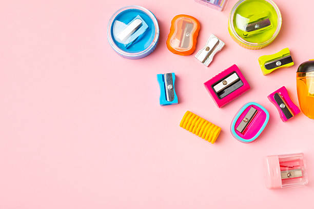 istock Pencil sharpener on bright colored background. Pencil and pencil shavings. Stationery. School supplies. School products. Flat lay. Place for text. copy space. 2233869923