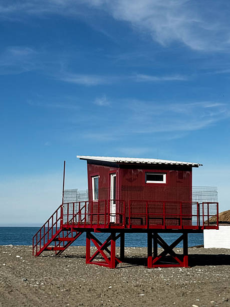 istock Elevated Lifeguard Hut on Beach with Ocean View 2233872047