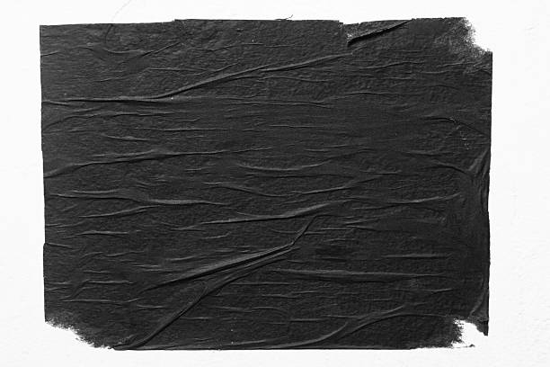istock Black blank poster with folds close up. 2233872173