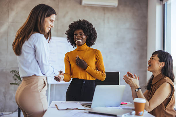 istock Diverse Team Celebrating Success in a Modern Office Setting 2233887192