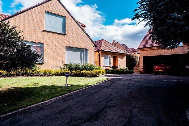 House with sold sign
