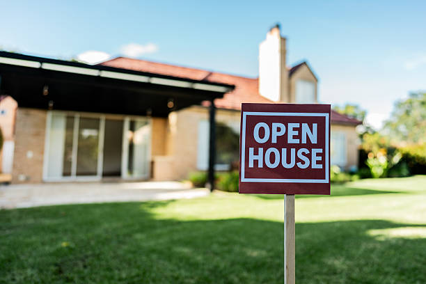 Open house sign at house yard