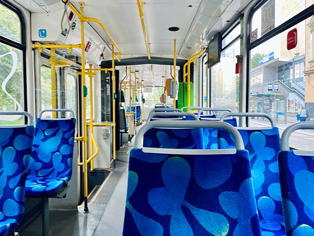 istock Szczecin, Poland- August 1 2025: Modern tram interior with blue patterned seats and yellow handrails, offering a clean and spacious ride. 2233897843