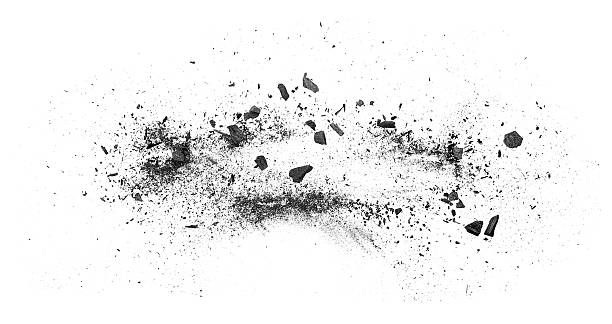 istock Black charcoal particles isolated on a white background, top view. Scattered black charcoal powder, exploding effect. 2233902111