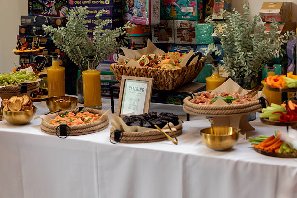 istock Corporate catering buffet displaying colorful appetizers, gourmet snacks, and refreshing beverages, prepared for professional gathering 2233902224