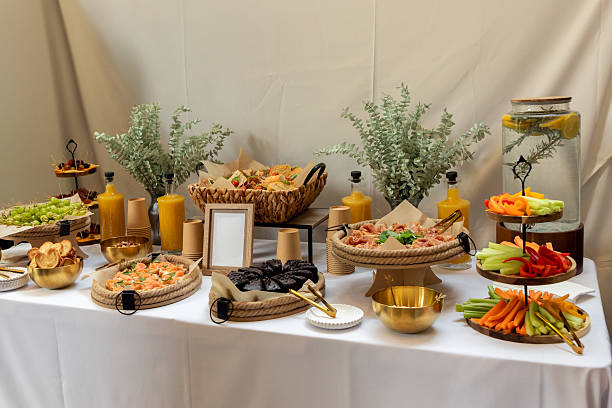 istock Catering service offering a delicious buffet with appetizers, sandwiches, and drinks, perfect for any kind of event 2233902287
