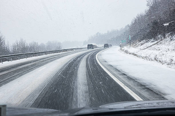 istock Winter Blizzard Snow Storm Expressway Sweeping Curve 2233902403