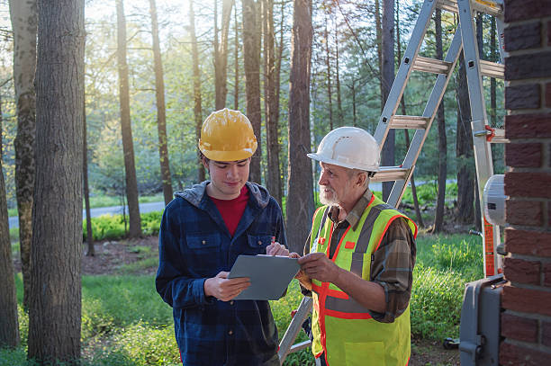 istock Neurodiverse trainee reviews safety protocols in Pennsylvania worksite. 2233907383
