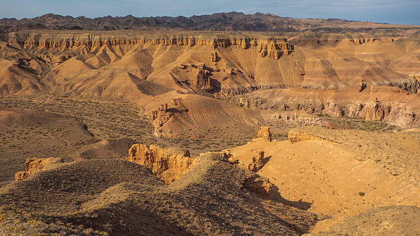 istock Vast Kazakh steppes meet dramatic canyons with towering cliffs and wind-carved rock 2233910838