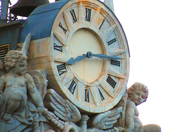 Madrid, Spain - July 05, 2025 Plaza de la Cibeles Madrid .  Buildings at the center of capital city.Bank of Spain .Clock in the tower.\nOverview of the building occupied by the Bank of Spain, located in Madrid's Plaza de la Cibeles.