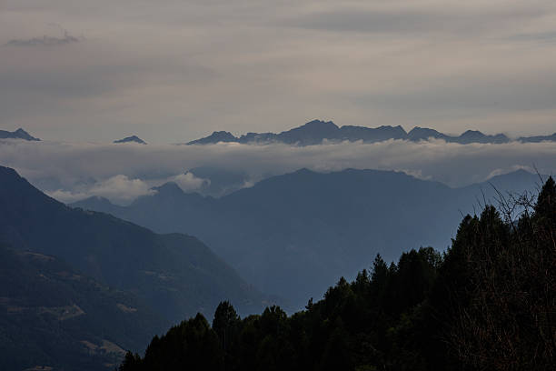 istock Rain clouds over the mountains from Fenilliaz (Aosta Valley, Italy) 2233912647