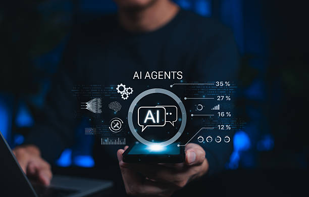 istock AI Agents and Data Analytics Technology Concept. Person holds smartphone with AI icons and data analytics representing artificial intelligence chatbot, digital assistant, machine learning automation, 2233914668