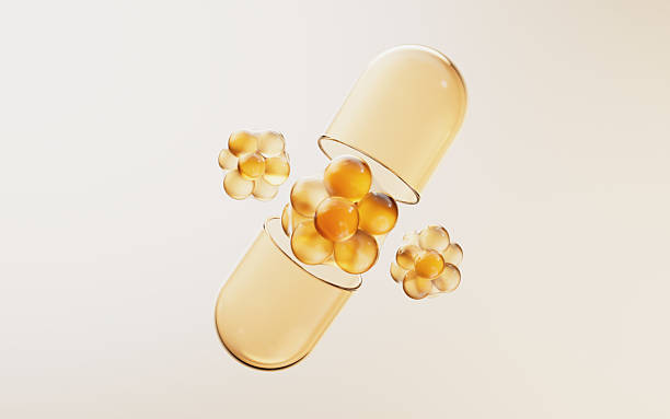 istock Golden medical capsule with biological concept, 3d rendering. 2233921599