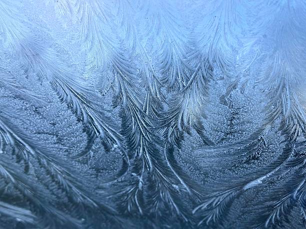 Horizontal new year navidad Christmas window frost patterns frostwork snow outside cold fragility fairytale magic greeting card wallpaper white wavy textured holiday concepts nature celebrate festive