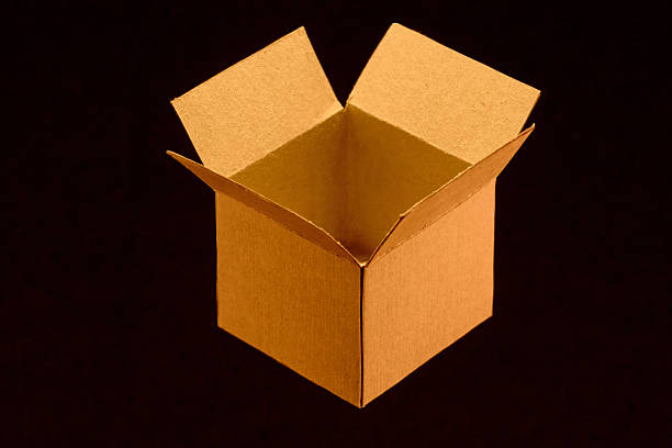 istock Open cardboard box on black background, unboxing and shopping logistics concept or merchandise transparency 2233925501