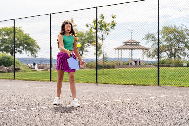 istock Latin young girl playing pickleball 2233928316