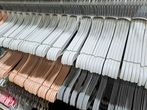 istock Row of coat hangers 2233929416
