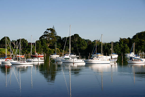 istock Boats moored in calm water 2233935544