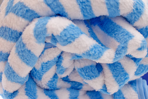 close up of blue and white striped pattern towel