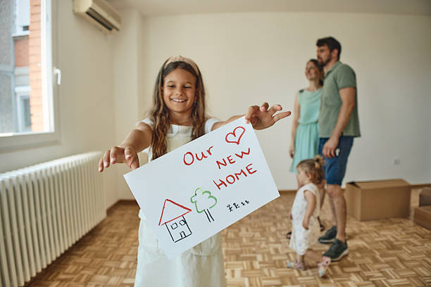 istock Family moving into new home 2233942162