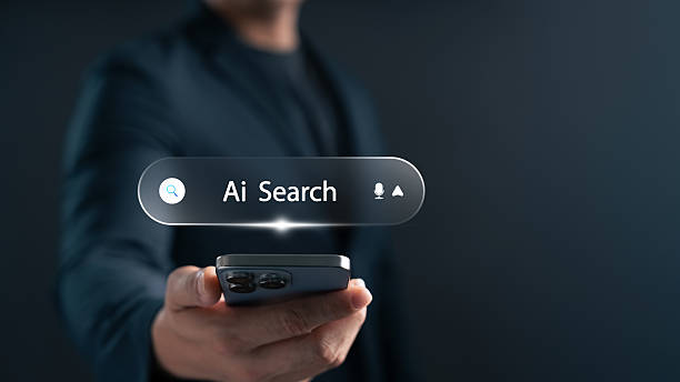 istock AI search technology with smart voice and text input. Man holding smartphone with virtual search interface, symbolizing intelligent online data discovery and innovation. 2233948737