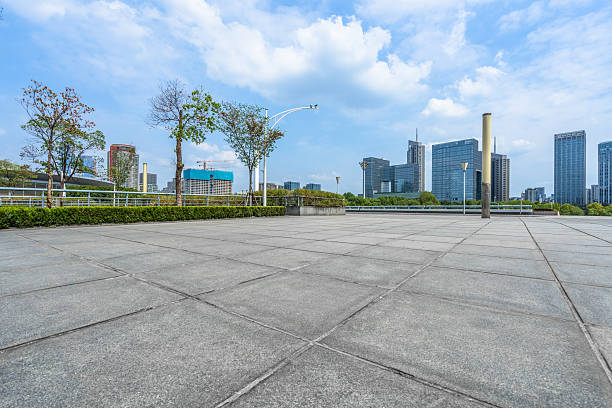 istock Panoramic skyline and buildings with empty concrete square floor 2233948936