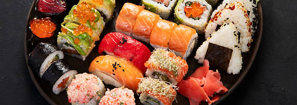 istock Sushi Set. Rolls, sushi of different types on a plate. 2233949642