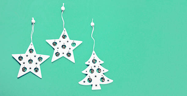 Christmas  composition on green background. Holiday concept. Flat lay, copy space.