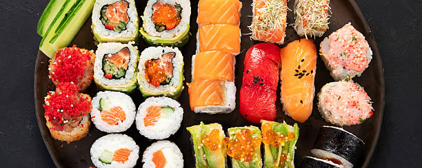 istock Sushi Set. Rolls, sushi of different types on a plate. 2233949891