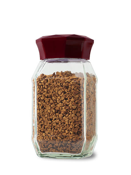 istock Glass jar with plastic lid red color with instant coffee drink. 2233953462