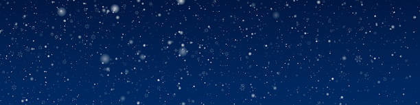 istock Falling snow on a dark Blue background. Winter scene with heavy snow, realistic snowflakes, and isolated snowfall. Overlay stock photo for Christmas designs and digital artwork. Night snowfall. White snowflakes. Isolated effect for overlays. Snow flakes. 2233955345