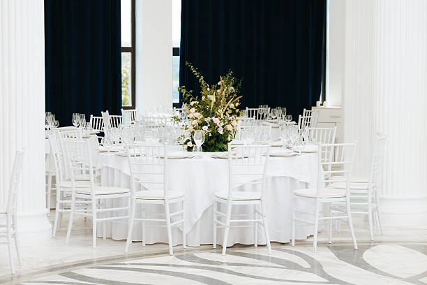 istock Elegant dining arrangement in a bright event space 2233956219