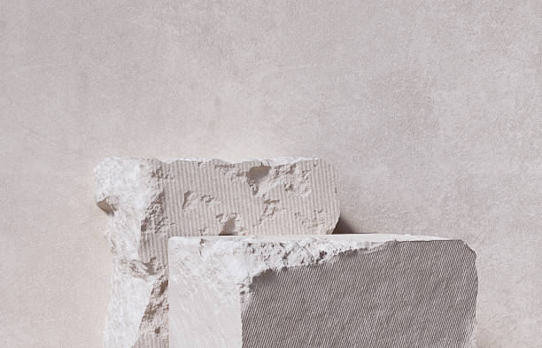 istock A minimalist product display with two broken stone blocks serving as a podium. The rough, natural texture and beige color wabi-sabi aesthetic 3D rendering background. 2233957392