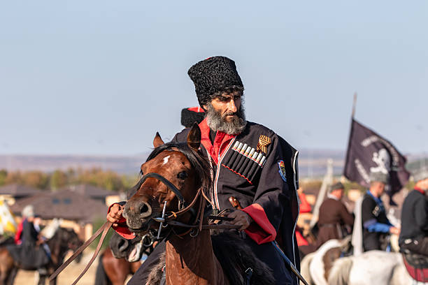 Zheleznovodsk - September 5: A Cossack in a traditional Circassian on horseback, with a sword and a hat on his head. September 5, 2025 in Zheleznovodsk, Russia