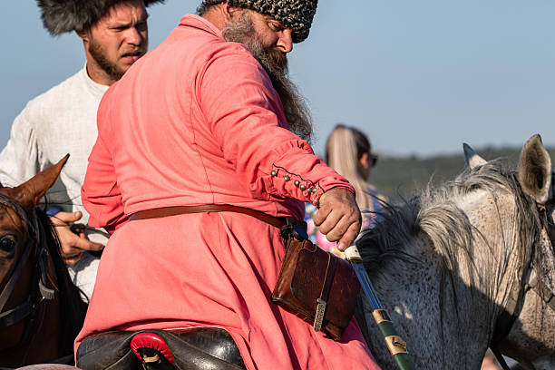 Zheleznovodsk - September 5: A Cossack in a traditional Circassian on horseback, with a sword and a hat on his head. September 5, 2025 in Zheleznovodsk, Russia